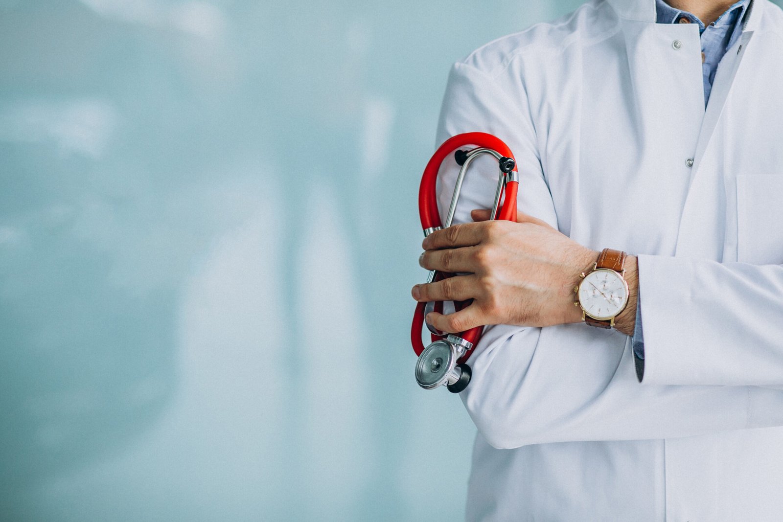 young handsome physician medical robe with stethoscope scaled
